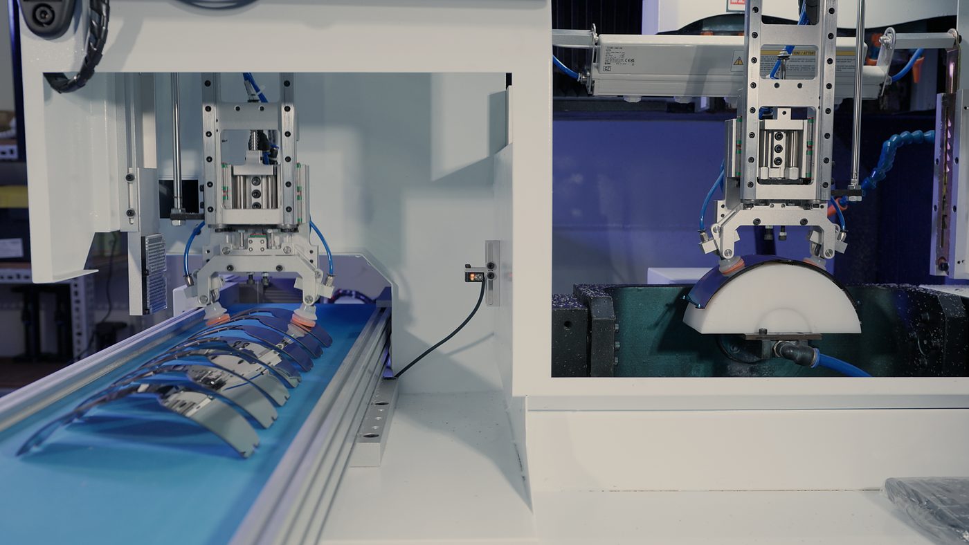 CNC lens cutting and handling